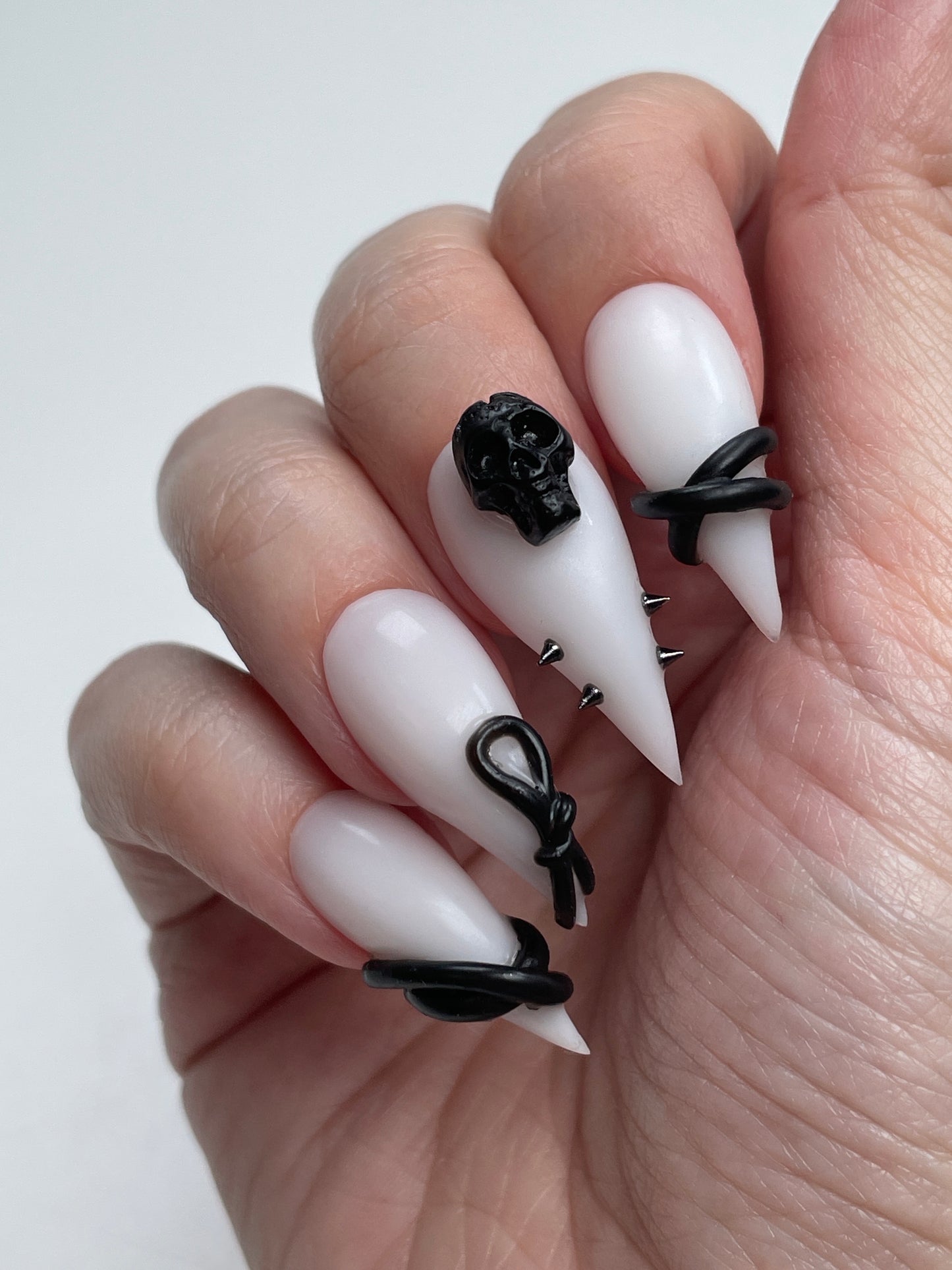 Gothic Claw Press On Nails – White with Black Skulls, Spikes & 3D Charms, Halloween Nail Set, Custom Sizes